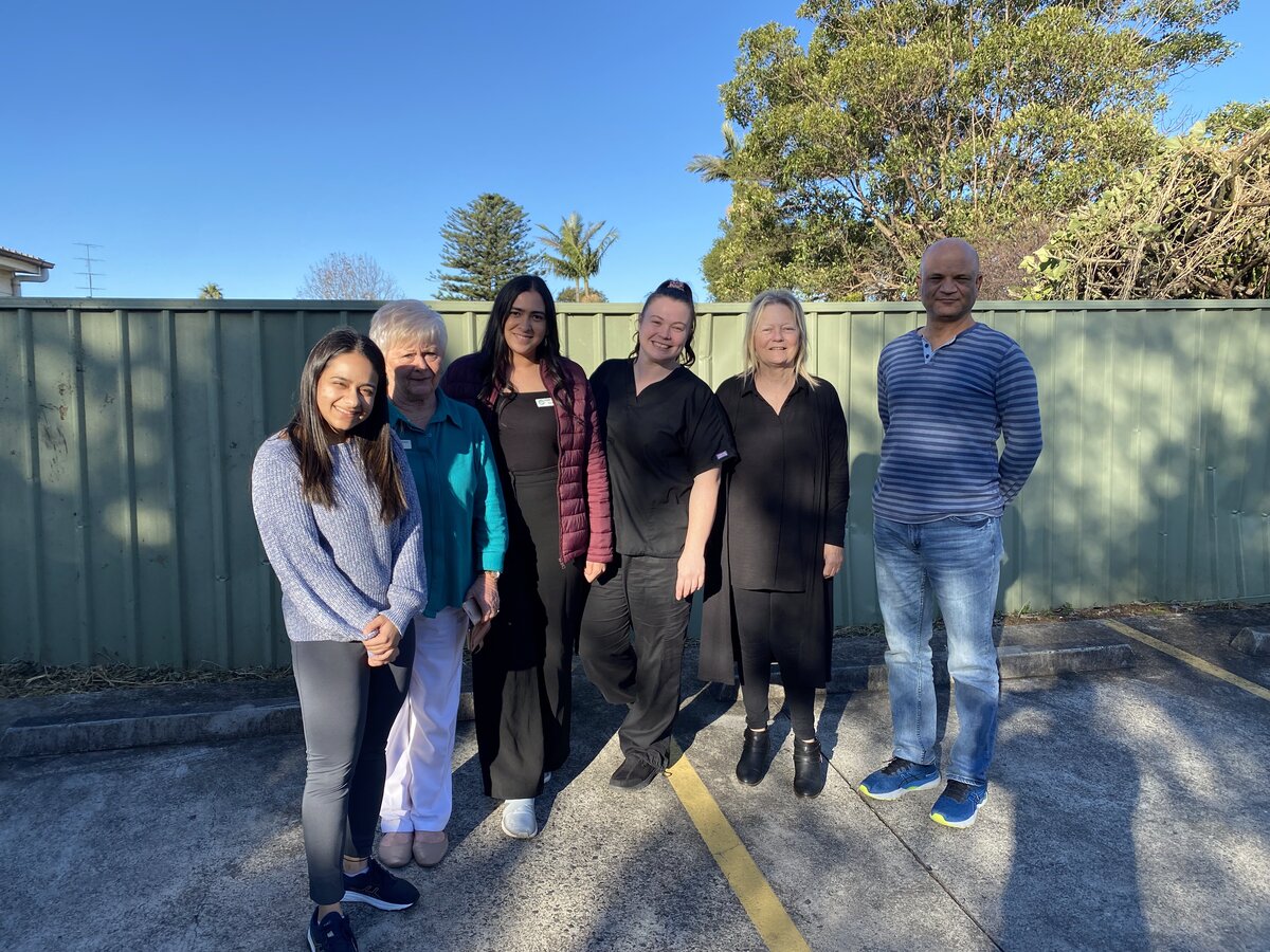 Staff team photo outdoors